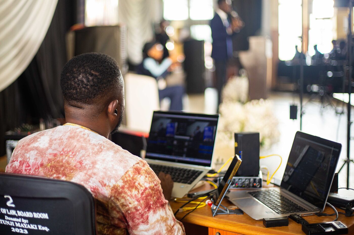 Live stream operator at the switching desk during an event